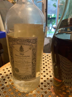 Hennessy cognac 1950 and gin 1960 bottles unopened