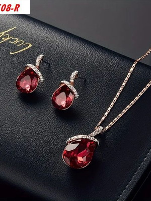 Necklace and earrings set of three pieces golden rose, new
