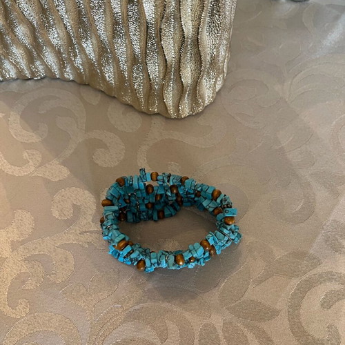 Elastic bracelet like new in blue and brown shades