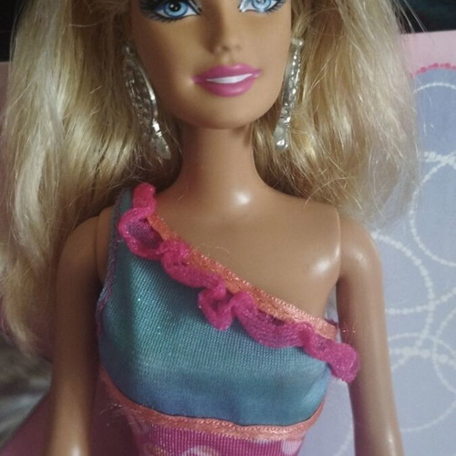 Barbie doll with 2012 Budget Heart Dress Glitz Barbie outfit