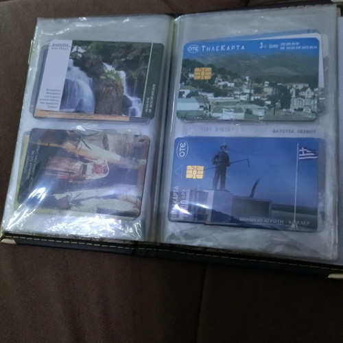 Collectible phone cards used with album