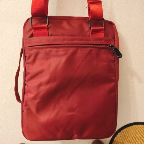 Waterproof red shoulder and hand bag for tablet