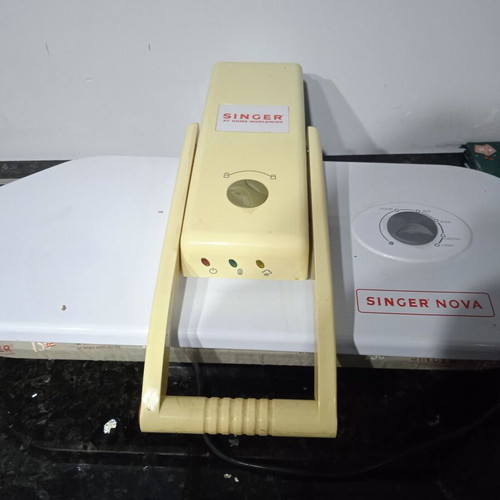 Singer ironing press slightly used