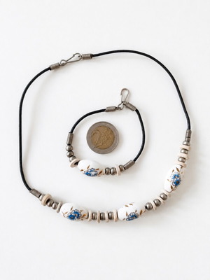 Vintage jewelry set with hand-painted white ceramic beads and gold accents
