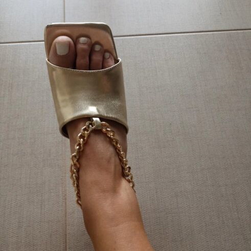 Mules gold like new with chain and low heel