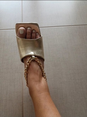 Mules gold like new with chain and low heel