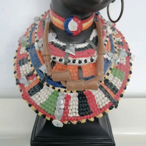 African figurine like new with intricate bead jewelry