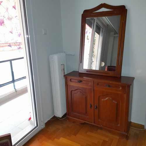 Vanity cabinet with framed mirror slightly used