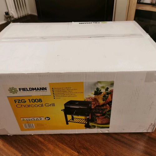 Charcoal grill new with lid, thermometer and adjustable charcoal height