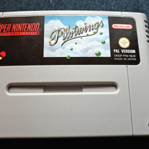 Pilotwings Super Nintendo Entertainment System game used with Greek manual