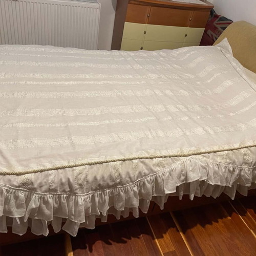 Quilt used with curtain fabric