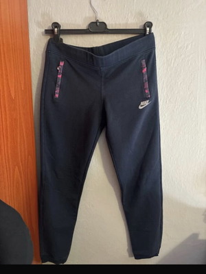 Tracksuit used, blue with pink details, size L