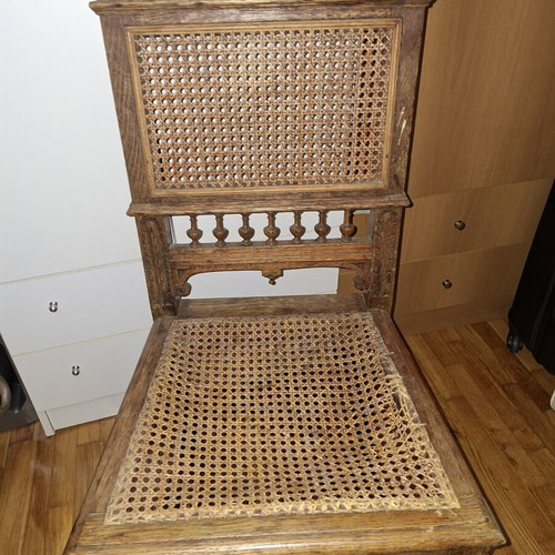 Vintage chair used with cane seat and carved details