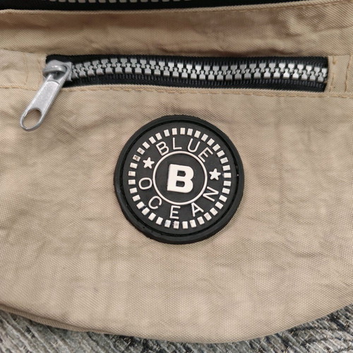 Beige waist bag like new with 3 compartments
