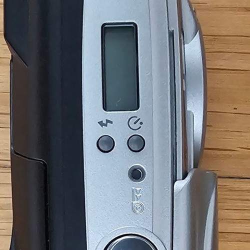 Olympus Superzoom 70G camera used with case