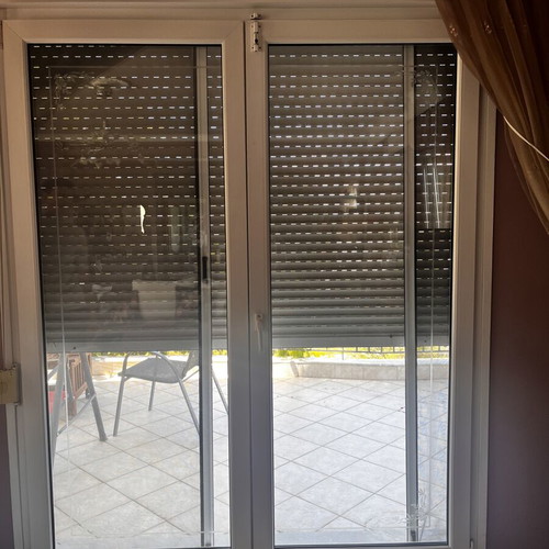 Balcony door 1.80x2.40 with roller shutter and screen, like new