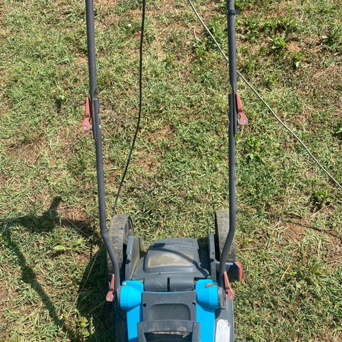 Electric lawn mower like new, easy to use