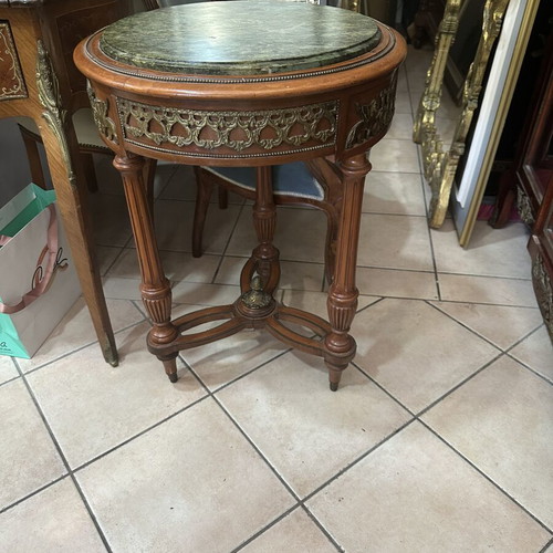 Table with bronze details and marble top used
