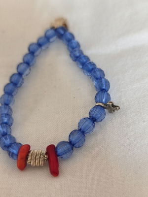 Bracelet with silver elements, coral beads and cross like new
