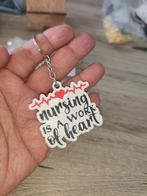 Handmade nursing keychain new with message "Nursing is a Work of Heart"