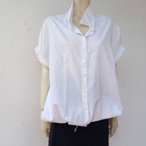 Oversize white shirt used with drawstring detail