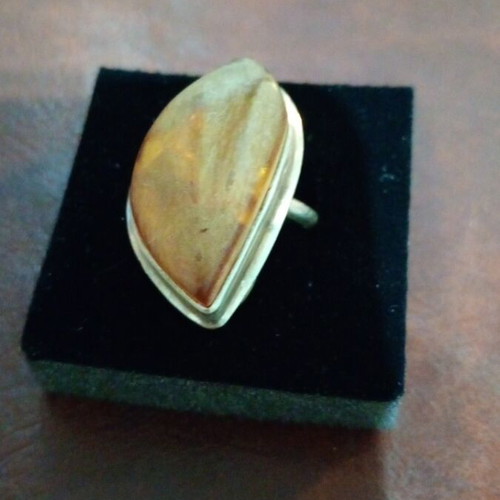 Silver women's ring with amber used