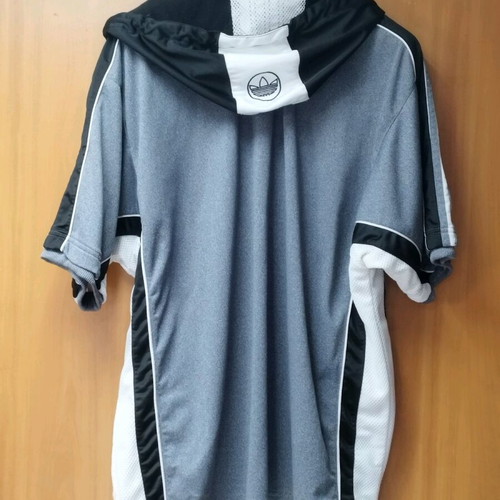 Vintage Adidas men's short sleeve tracktop from 1990, used, size XL