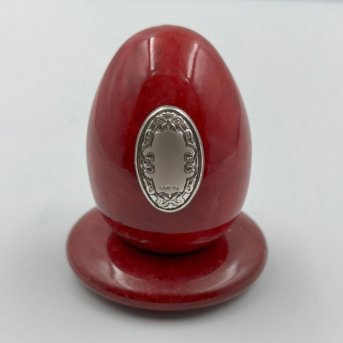 Alabaster red egg with silver decoration and base, new