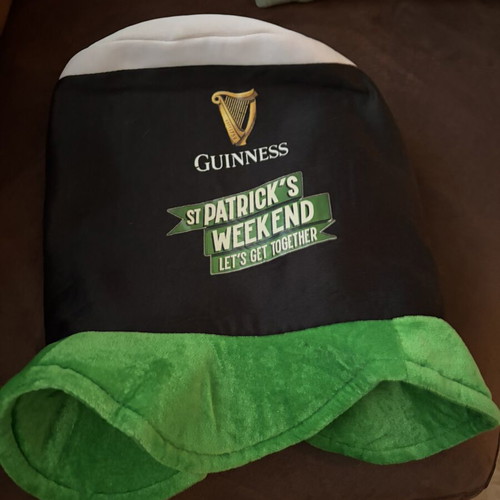 Large black and green hat