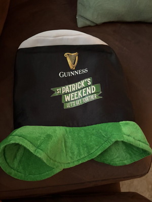 Large black and green hat