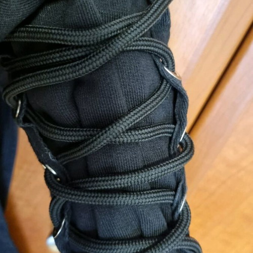 Black sweatshirt used with unique sleeves and asymmetrical design