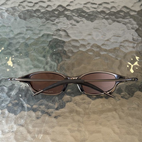 Oakley Juliet X-Metal sunglasses with gold iridium polarized lenses
