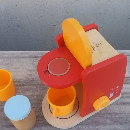 Wooden coffee maker toy used with plastic cups and milk jug