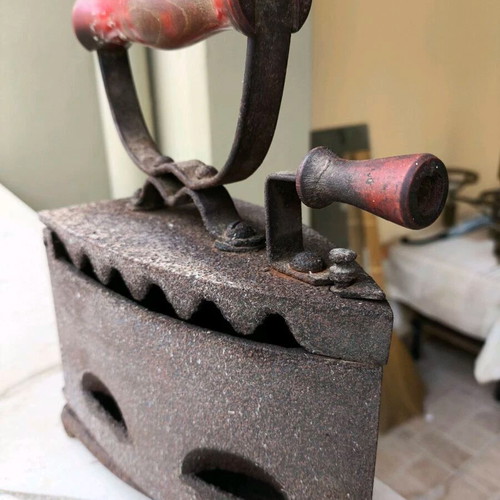 Antique iron used, late 19th century with base