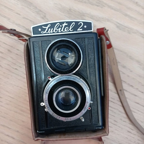 Lubitel 2 camera used with brown leather case