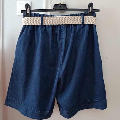 Women's denim shorts with woven belt