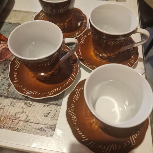 Coffee cups set of 4 like new, brown with saucers