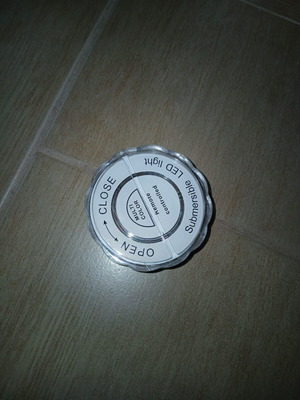 Round LED light with remote control, battery operated, multicolor