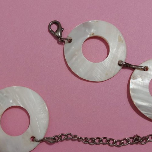 White belt with round circles used and metal links