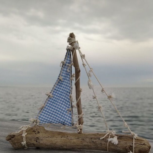 Decorative handmade boat new with driftwood