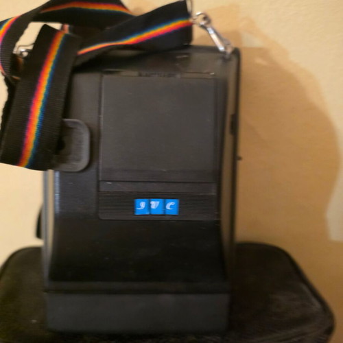 Kodak Colorburst 250 vintage instant camera with electronic flash, strap and case