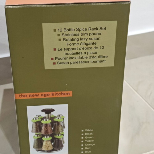 Rotating spice rack with 12 glass containers