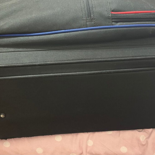 Benetton fabric black suitcase used with two wheels