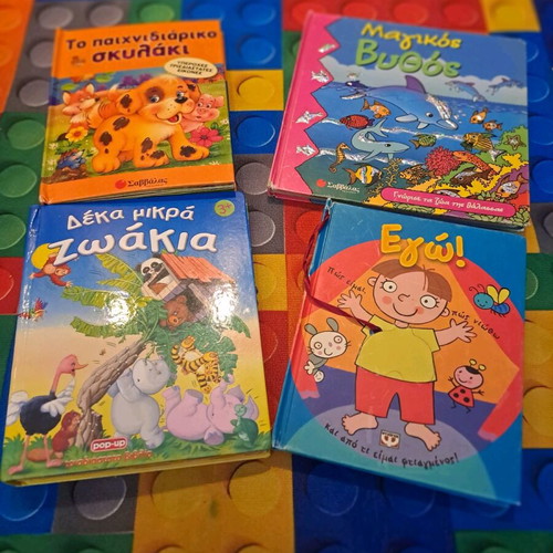 Set of 4 used infant and toddler children's books with imperfections