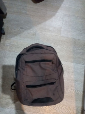 Branded backpack in excellent condition, gray and beige