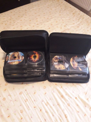 DVD collection like new, 150 discs with movies and documentaries