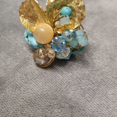 Handmade ring new with adjustable size, blue and gold colors