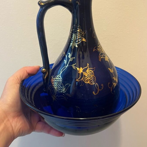 Decorative bottle used, blue glass with gold details