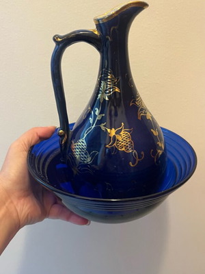 Decorative bottle used, blue glass with gold details