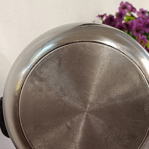 Pressure cooker used, old style, stainless steel with safety lid